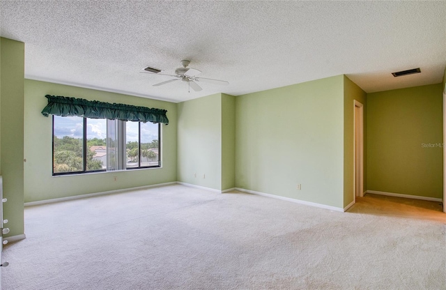 700 Starkey Rd Unit 1145, Largo, FL 33771 - carpeted empty room featuring a ceiling fan and a textured ceiling