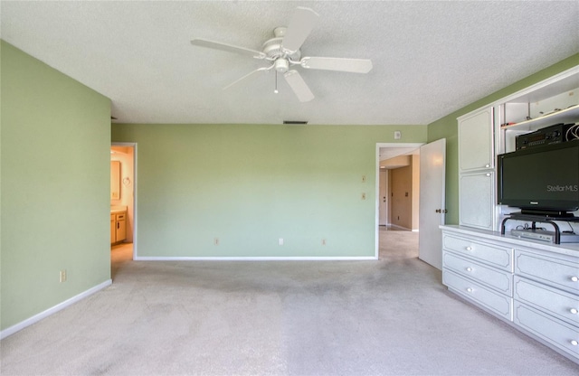 700 Starkey Rd Unit 1145, Largo, FL 33771 - unfurnished bedroom with light carpet, a textured ceiling, and ceiling fan
