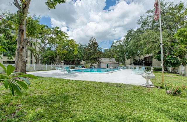 700 Starkey Rd Unit 1145, Largo, FL 33771 - community pool featuring a patio area