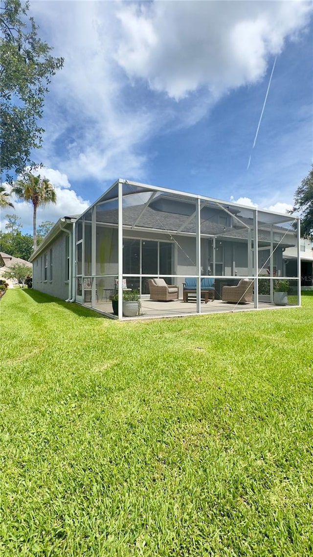 27312 Edenfield Dr, Wesley Chapel, FL 33544 - back of house with a patio area, a yard, a lanai, and a swimming pool