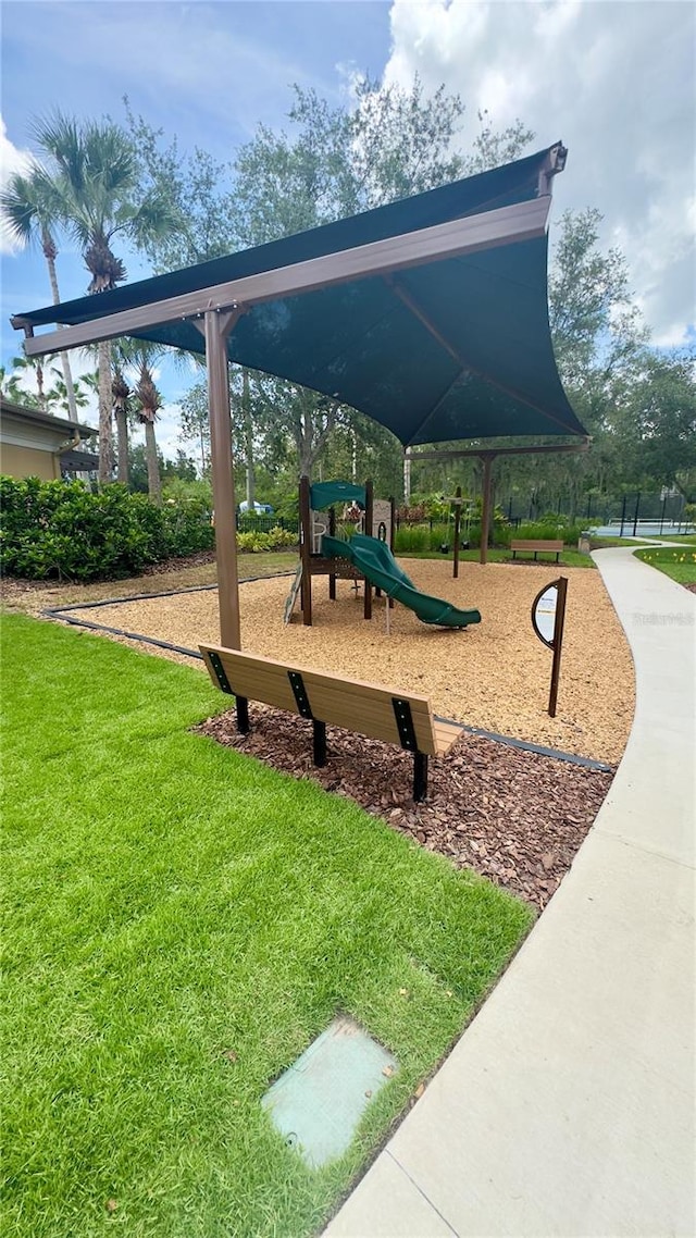 27312 Edenfield Dr, Wesley Chapel, FL 33544 - view of jungle gym with a lawn