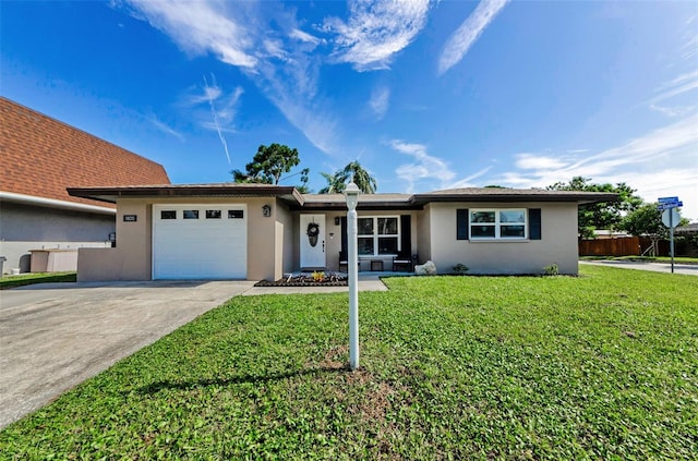 1800 Mapleleaf Blvd, Oldsmar, FL 34677 - single story home featuring stucco siding, a garage, and driveway