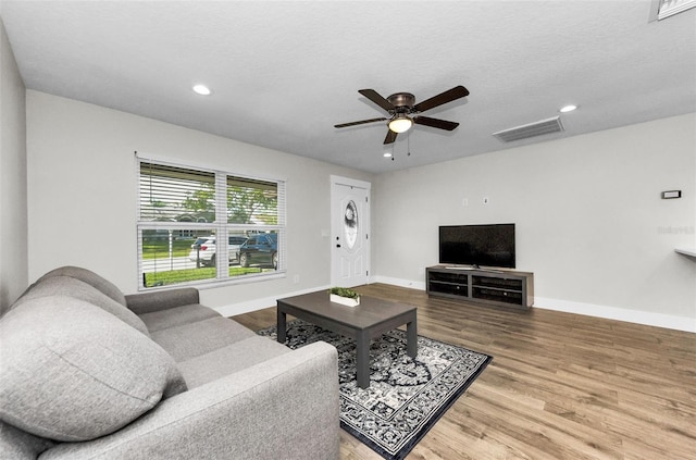 1800 Mapleleaf Blvd, Oldsmar, FL 34677 - living area featuring a ceiling fan, wood finished floors, and recessed lighting