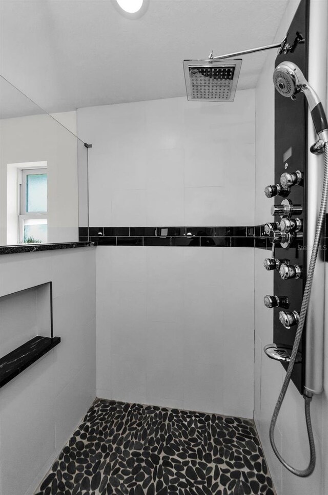 1800 Mapleleaf Blvd, Oldsmar, FL 34677 - full bathroom featuring a tile shower