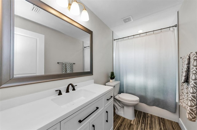 1800 Mapleleaf Blvd, Oldsmar, FL 34677 - bathroom featuring vanity, wood finished floors, and shower / bathtub combination with curtain