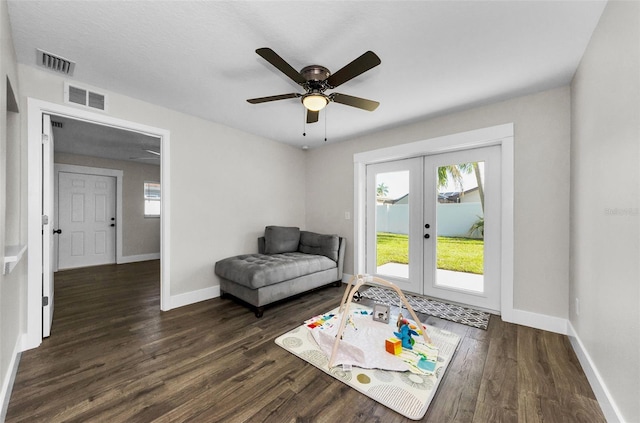 1800 Mapleleaf Blvd, Oldsmar, FL 34677 - sitting room with french doors, dark wood-style floors, and ceiling fan