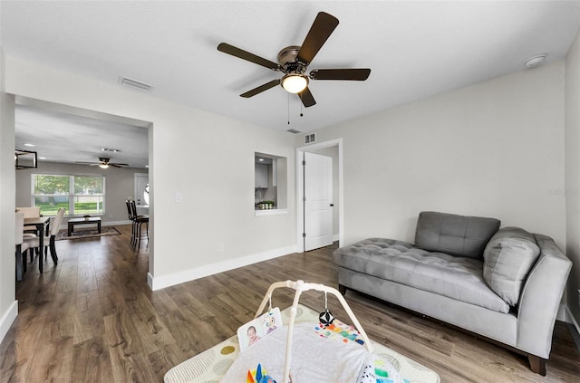 1800 Mapleleaf Blvd, Oldsmar, FL 34677 - living room featuring a ceiling fan and wood finished floors