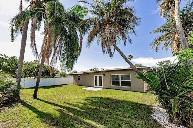 1800 Mapleleaf Blvd, Oldsmar, FL 34677 - rear view of house featuring french doors and stucco siding
