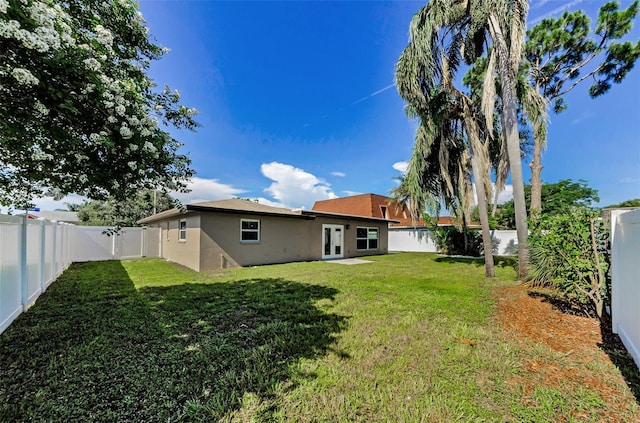 1800 Mapleleaf Blvd, Oldsmar, FL 34677 - fenced backyard with french doors