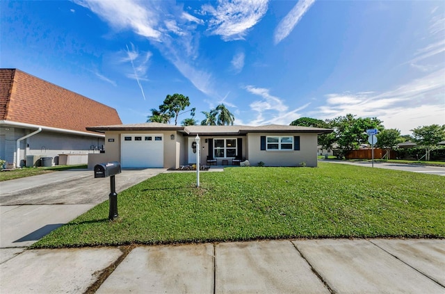 1800 Mapleleaf Blvd, Oldsmar, FL 34677 - single story home featuring stucco siding, concrete driveway, an attached garage, and a front lawn