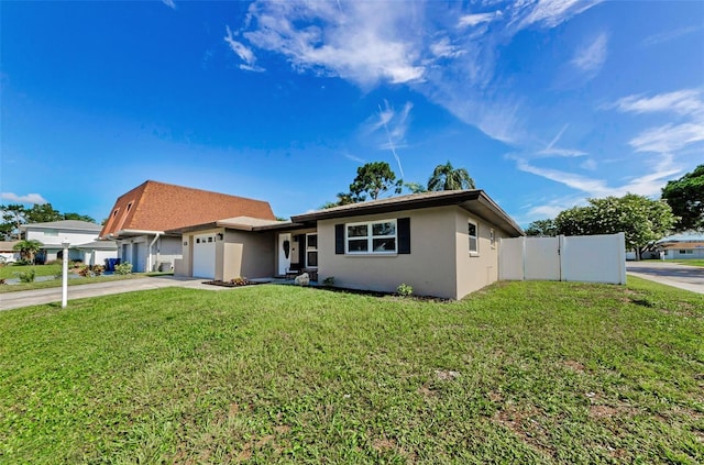 1800 Mapleleaf Blvd, Oldsmar, FL 34677 - ranch-style home featuring an attached garage, stucco siding, and driveway