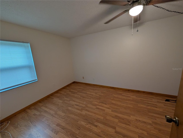 11308 Echo View Dr, Odessa, FL 33556 - spare room with wood finished floors and ceiling fan