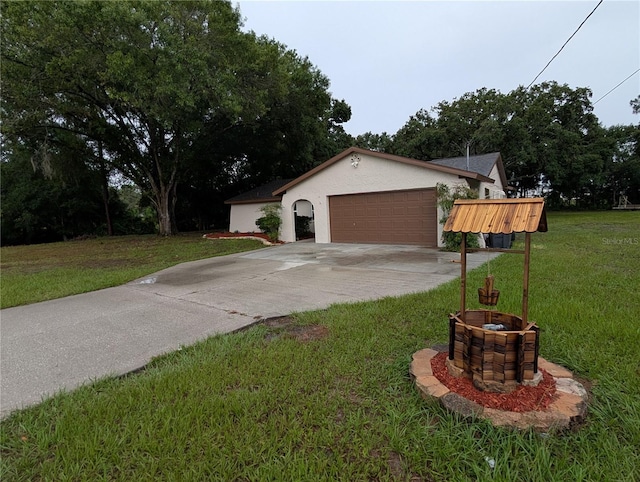 11308 Echo View Dr, Odessa, FL 33556 - view of front of property with concrete driveway, a front yard, stucco siding, and a garage