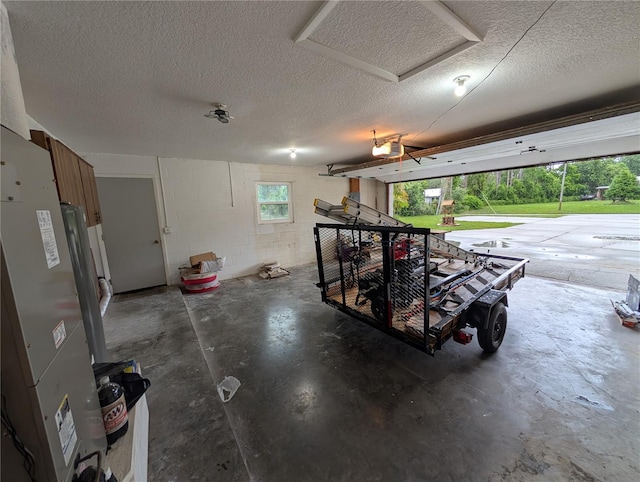 11308 Echo View Dr, Odessa, FL 33556 - garage featuring concrete block wall and a garage door opener