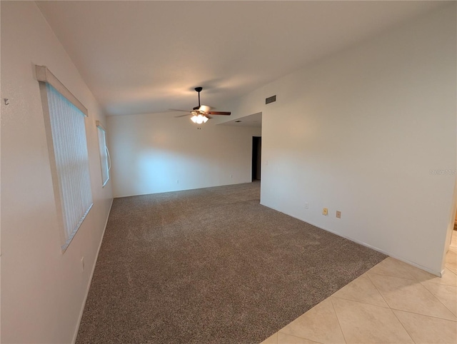 11308 Echo View Dr, Odessa, FL 33556 - spare room featuring ceiling fan, light colored carpet, lofted ceiling, and light tile patterned floors