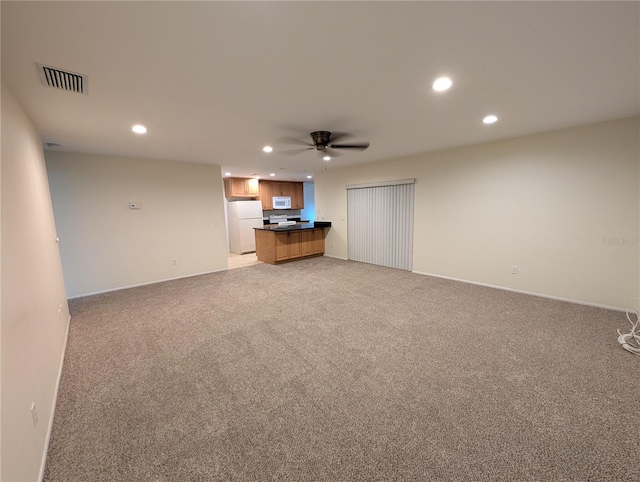 11308 Echo View Dr, Odessa, FL 33556 - unfurnished living room featuring recessed lighting, light carpet, and a ceiling fan
