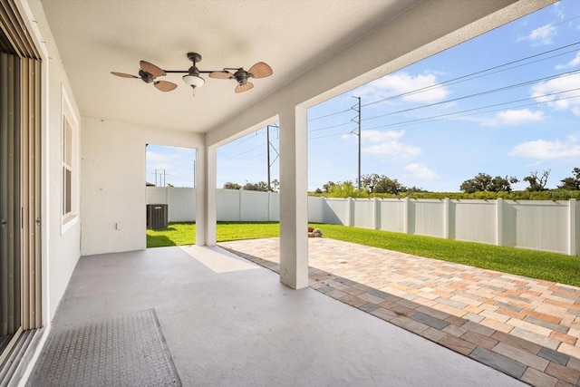 11745 Brighton Knoll Loop, Riverview, FL 33579 - fenced backyard featuring a ceiling fan and a patio area