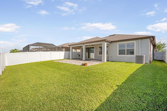 11745 Brighton Knoll Loop, Riverview, FL 33579 - rear view of house with a patio area, stucco siding, a fenced backyard, and roof with shingles