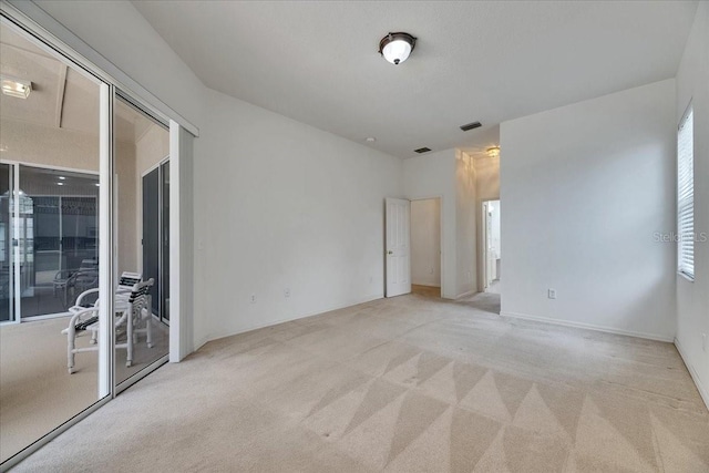 1216 Fox Chapel Dr, Lutz, FL 33549 - spare room with light carpet