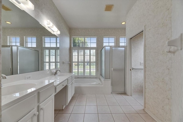 1216 Fox Chapel Dr, Lutz, FL 33549 - full bath featuring plenty of natural light, a shower stall, double vanity, and a bath