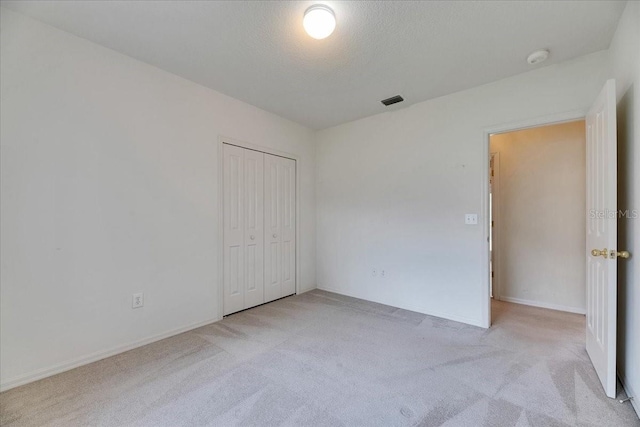 1216 Fox Chapel Dr, Lutz, FL 33549 - unfurnished bedroom with carpet floors and a closet