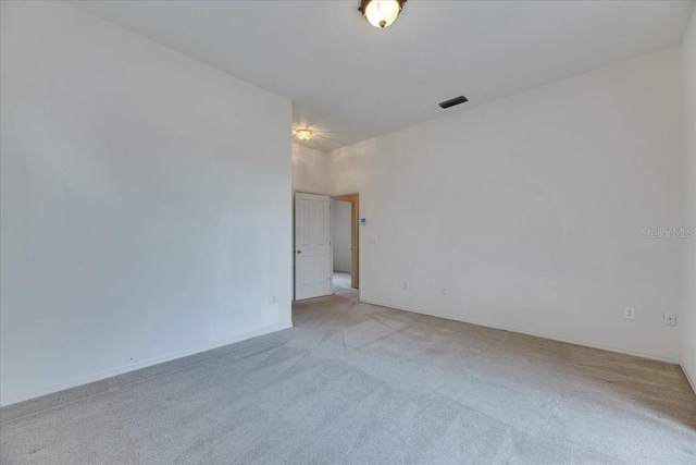 1216 Fox Chapel Dr, Lutz, FL 33549 - unfurnished room with light colored carpet