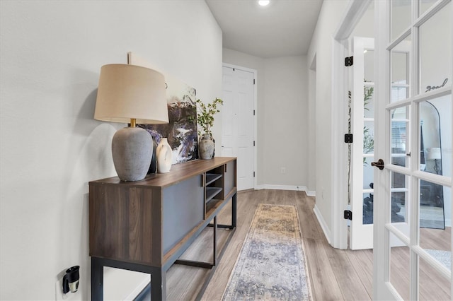 6352 Mooring Line Cir, Apollo Beach, FL 33572 - hallway with wood finished floors and baseboards