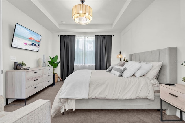 6352 Mooring Line Cir, Apollo Beach, FL 33572 - carpeted bedroom with a tray ceiling and a chandelier