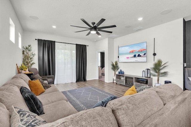 6352 Mooring Line Cir, Apollo Beach, FL 33572 - living area with ceiling fan, wood finished floors, recessed lighting, and plenty of natural light