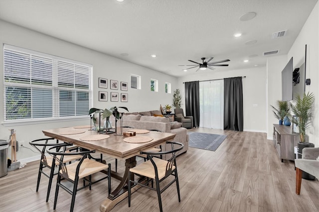 6352 Mooring Line Cir, Apollo Beach, FL 33572 - dining area with light wood-style flooring, a ceiling fan, and recessed lighting