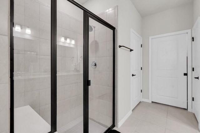 6352 Mooring Line Cir, Apollo Beach, FL 33572 - bathroom featuring a stall shower and tile patterned flooring