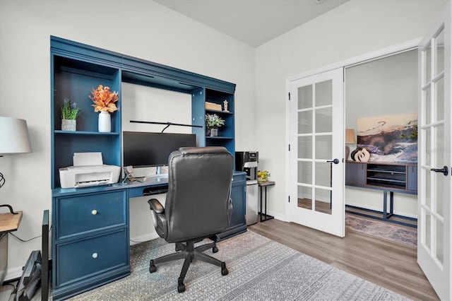 6352 Mooring Line Cir, Apollo Beach, FL 33572 - office area with french doors and wood finished floors