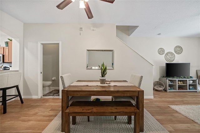 2349 Willimette Dr, Wesley Chapel, FL 33543 - dining area with light wood finished floors and ceiling fan