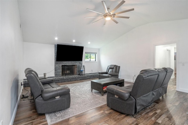 2701 Herndon St, Valrico, FL 33596 - living room featuring a ceiling fan, vaulted ceiling, wood finished floors, a fireplace, and recessed lighting