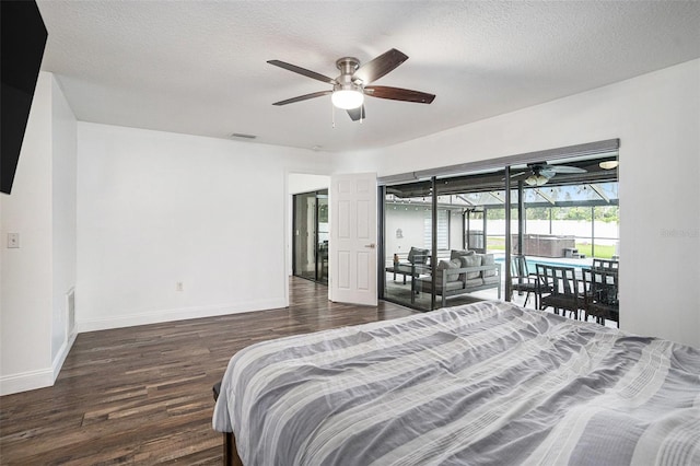 2701 Herndon St, Valrico, FL 33596 - bedroom with access to exterior, wood finished floors, a textured ceiling, and ceiling fan