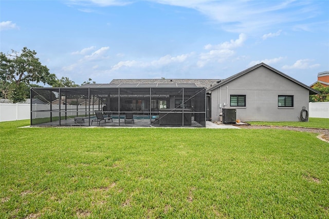 2701 Herndon St, Valrico, FL 33596 - rear view of property with a pool, a patio, a fenced backyard, a lanai, and stucco siding