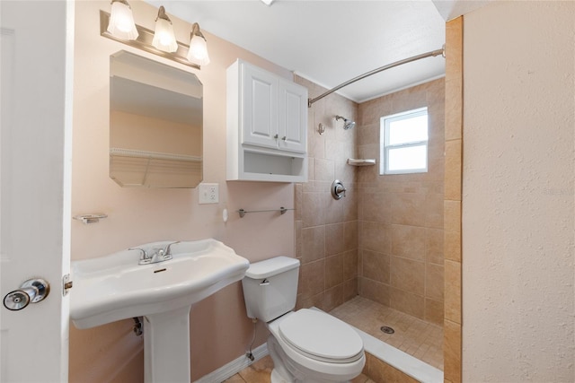 5720 Mockingbird Dr, New Port Richey, FL 34652 - bathroom featuring toilet and a tile shower