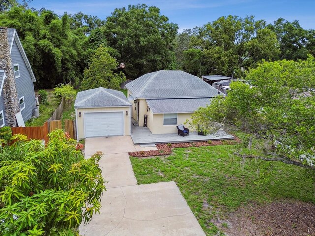 1722 Albemarle Rd, Clearwater, FL 33764 - view of front of property featuring driveway, stucco siding, and a garage