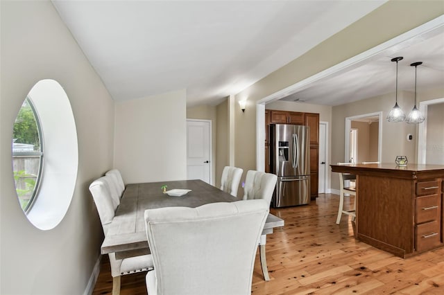 1722 Albemarle Rd, Clearwater, FL 33764 - dining room with light wood-style floors and baseboards