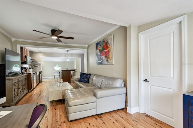 1722 Albemarle Rd, Clearwater, FL 33764 - living area featuring crown molding, light wood finished floors, and ceiling fan