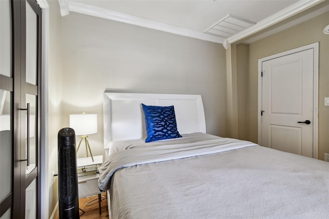 1722 Albemarle Rd, Clearwater, FL 33764 - bedroom featuring ornamental molding and wood finished floors
