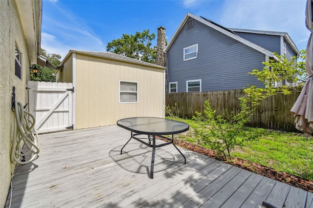 1722 Albemarle Rd, Clearwater, FL 33764 - wooden deck featuring a fenced backyard and a gate