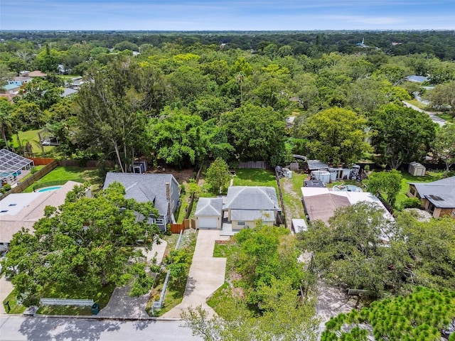 1722 Albemarle Rd, Clearwater, FL 33764 - aerial perspective of suburban area with a heavily wooded area