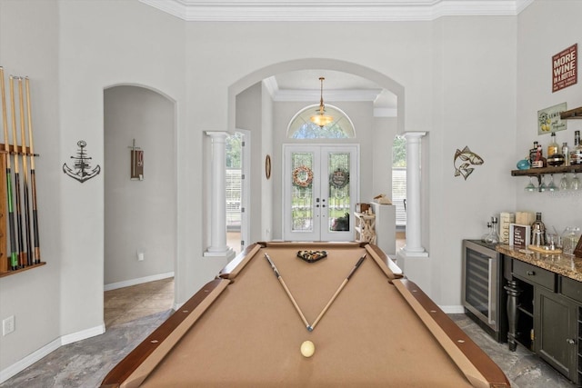 2900 W Lantana Dr, Beverly Hills, FL 34465 - recreation room with a bar, french doors, arched walkways, beverage cooler, and billiards