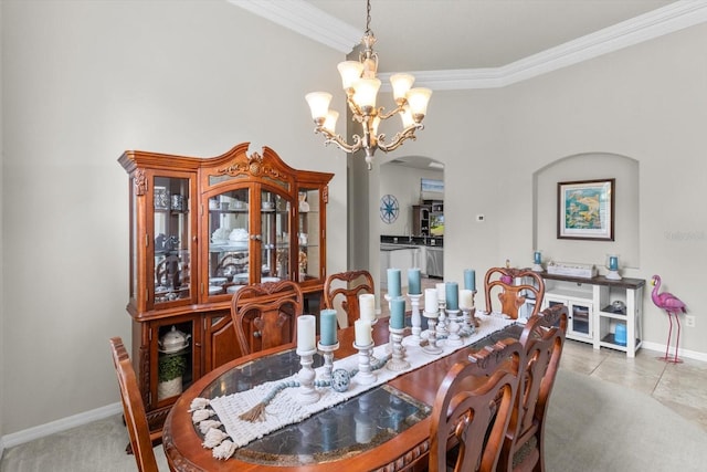 2900 W Lantana Dr, Beverly Hills, FL 34465 - dining room with arched walkways, crown molding, and a chandelier