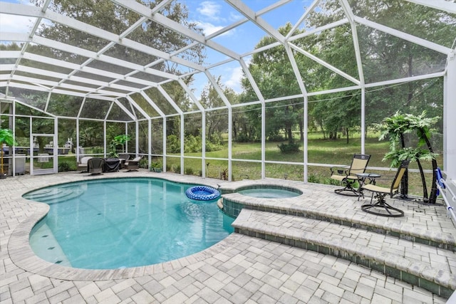 2900 W Lantana Dr, Beverly Hills, FL 34465 - view of pool featuring a patio area, glass enclosure, and a pool with connected hot tub
