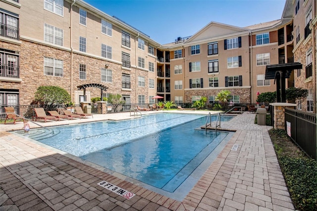 4221 W Spruce St Unit 2328, Tampa, FL 33607 - community pool with a patio area