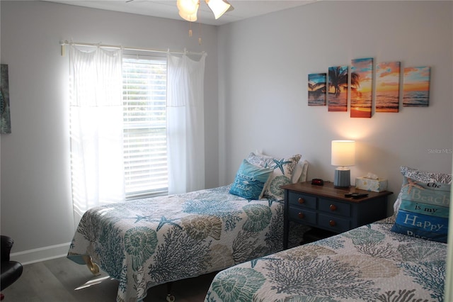 12760 Indian Rocks Rd Unit 909, Largo, FL 33774 - bedroom featuring wood finished floors and baseboards