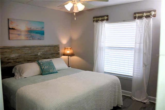 12760 Indian Rocks Rd Unit 909, Largo, FL 33774 - bedroom with wood finished floors and a ceiling fan