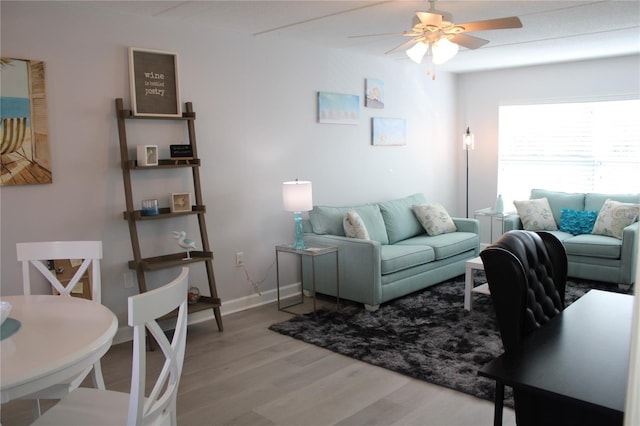 12760 Indian Rocks Rd Unit 909, Largo, FL 33774 - living area with light wood finished floors and ceiling fan